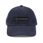 ETA Audio corduroy dad hat in navy with leather logo patch, front view