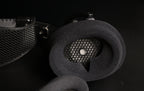 ETA Ada open-back headphone with stock cable on wooden desk beside tube headphone amplifier