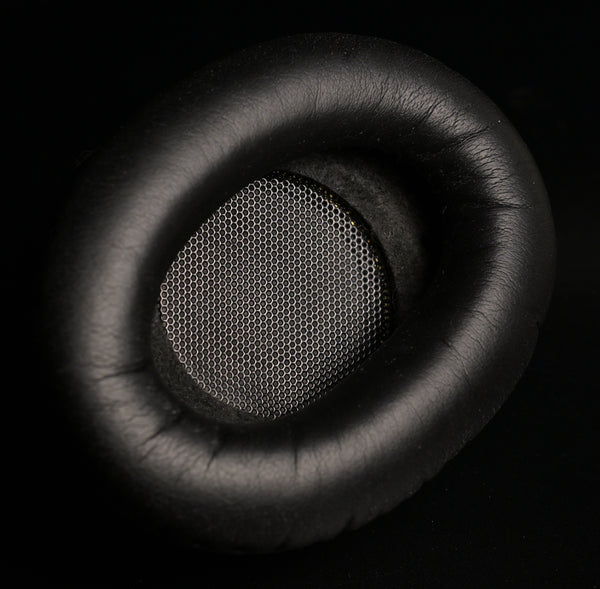 2022 — ETA Mini Closed — ETA Mini Closed earpad close up showing leatherette outer ring and metal mesh driver protector