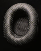 ETA Mini Semi-Closed perforated leatherette earpad close up with metal mesh driver protector