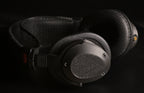 ETA Mini Semi-Closed three-quarter view with diamond mesh grill and perforated earpads