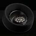 ETA ULI earcup viewed from above, black suede earpad surrounding the 3D-printed driver baffle with floral spoke pattern over the AlNiCo magnet