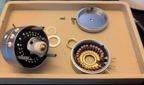 HID headphone preamp internal close-up showing stepped attenuator switch and circuit board