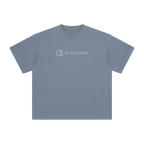 ETA Audio washed cotton t-shirt in washed blue, front view with chest logo on black background